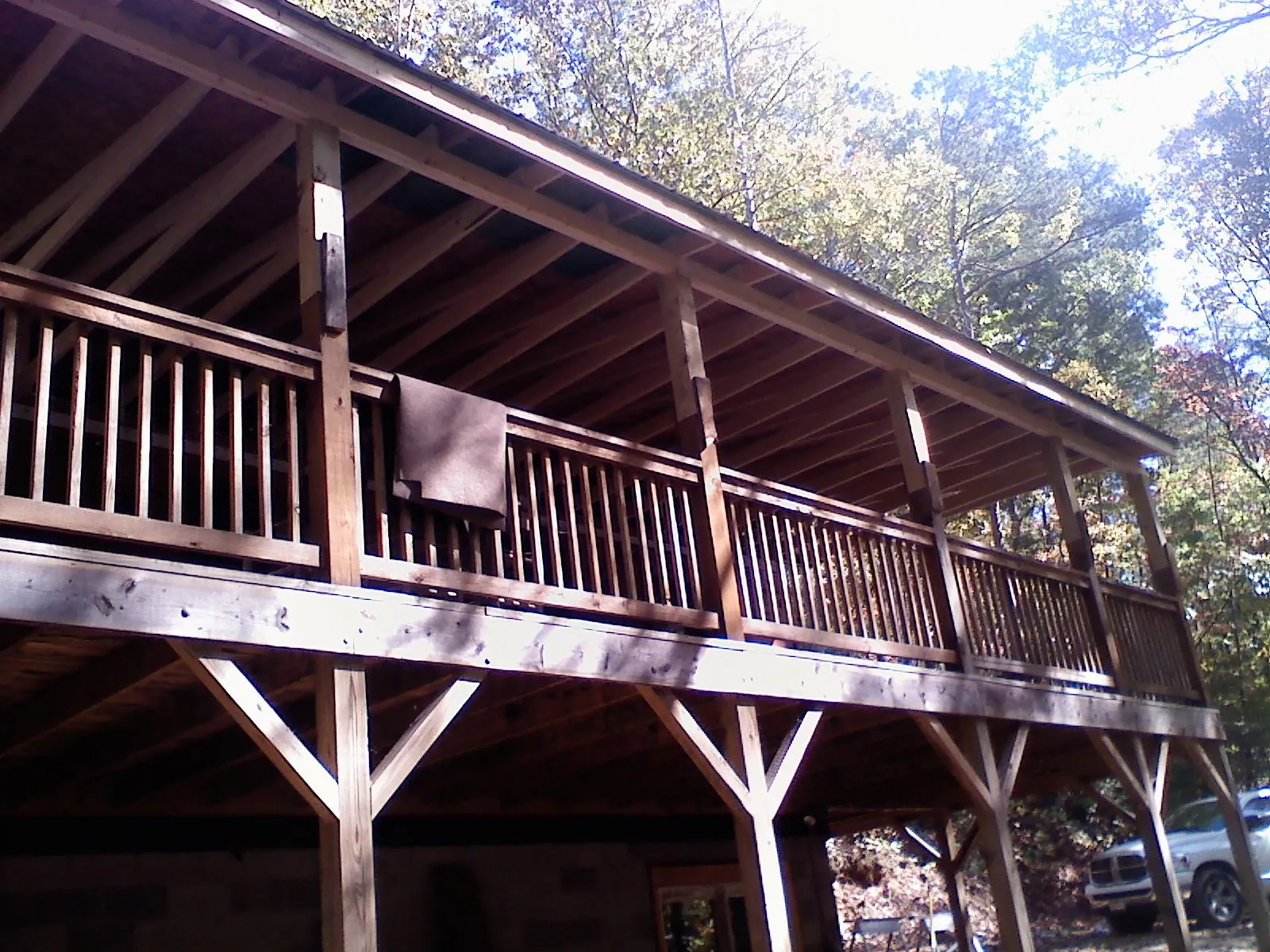 Timber framing under a new elevated porch and deck — Roof Leak Repair in Noatak by Roofing Brothers